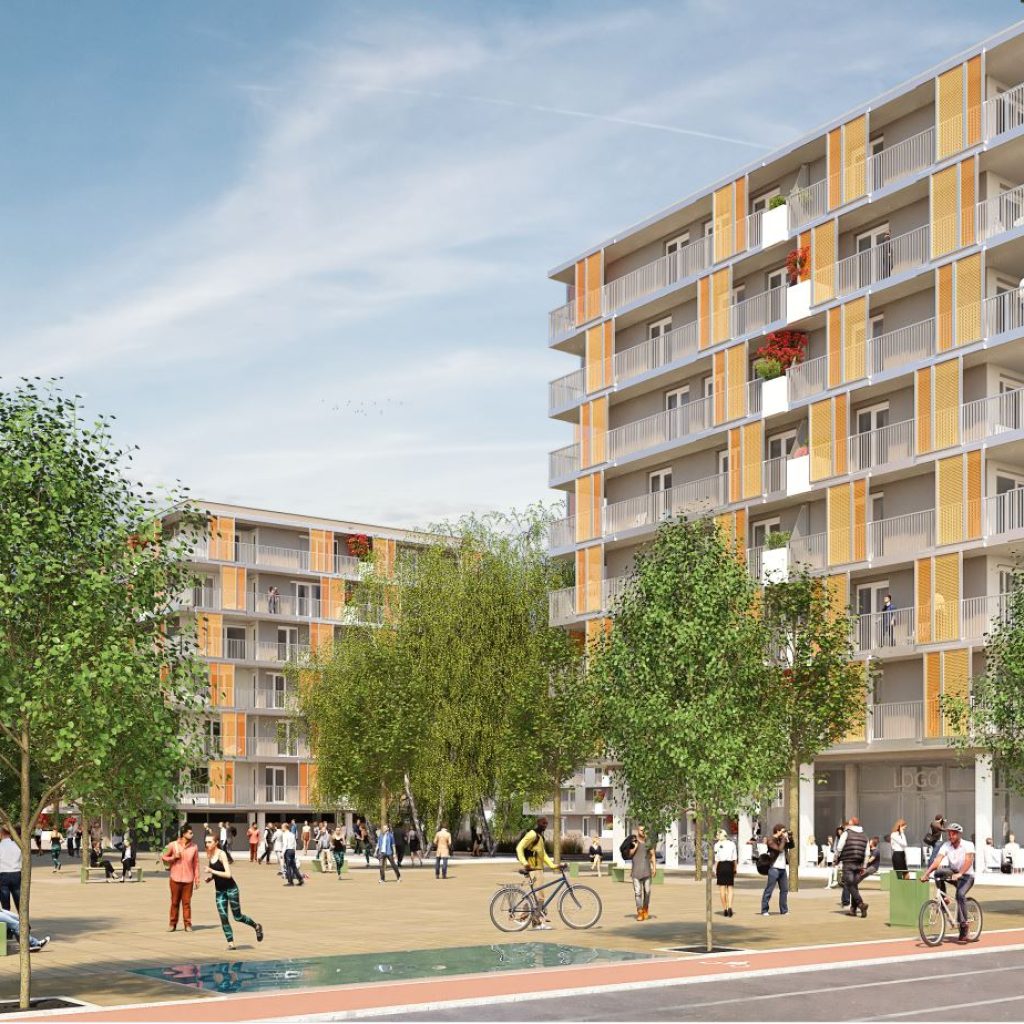 Mehrere mehrgeschoßige Wohngebäude um begrünten Vorplatz im Bezirk Reininghaus, Straßenbahn fährt vorbei